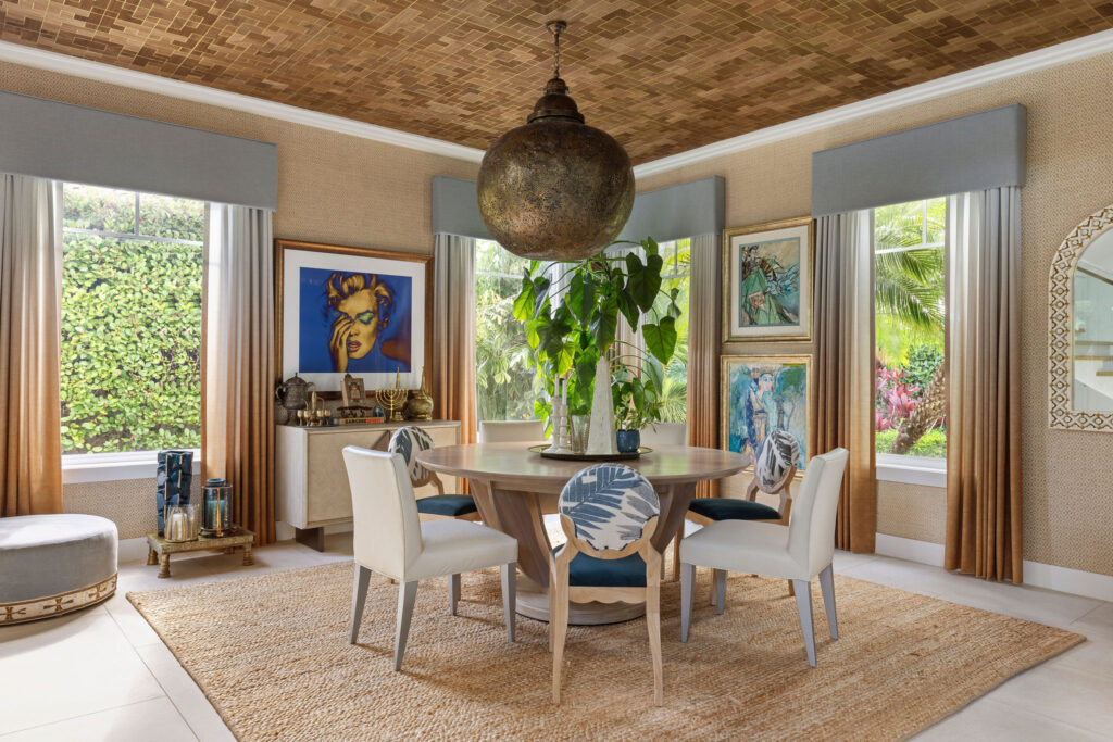 Wolfe Residence dining room with upholstered chairs and patterned ceiling